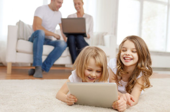 Children and Adults Looking at Computer Screens