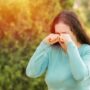 Woman Suffering From Eye Allergies