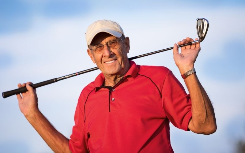 Elderly Man Golfing after Cataract Surgery