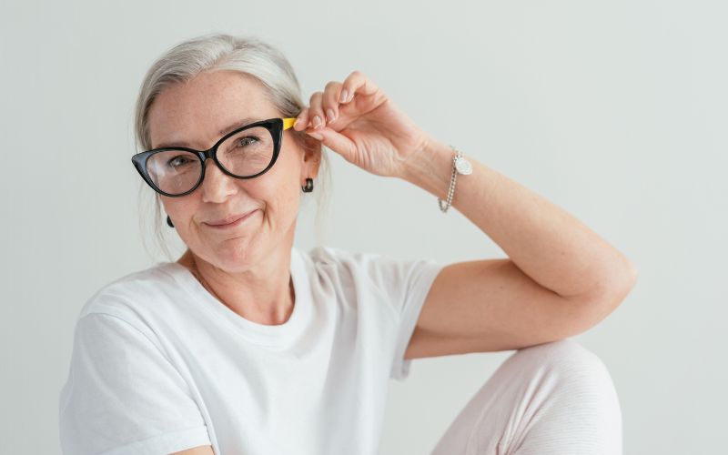Elderly Woman Selecting frames for her face shape